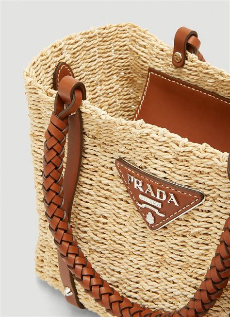 prada raffia handbag.